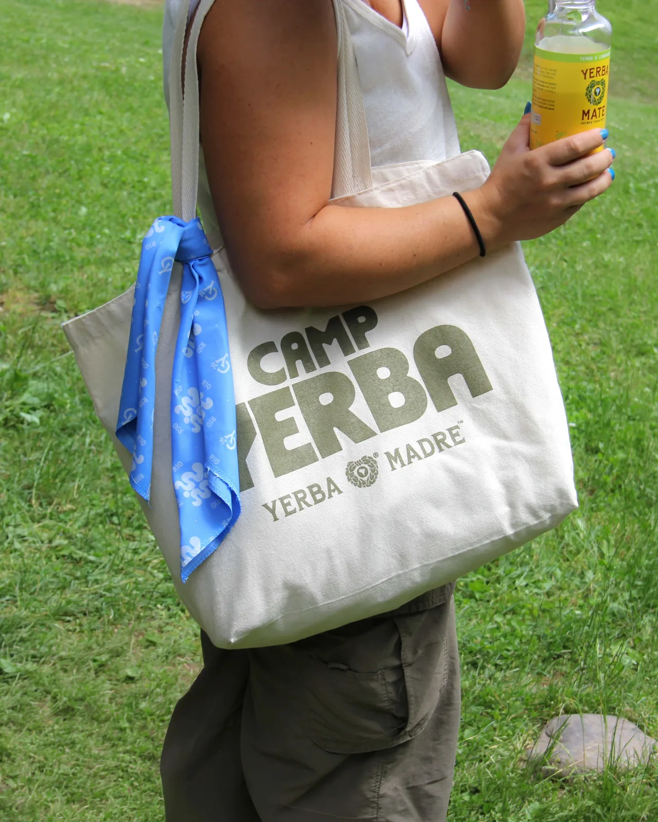 Canvas Camp Yerba tote bag with a blue bandana tied to the strap