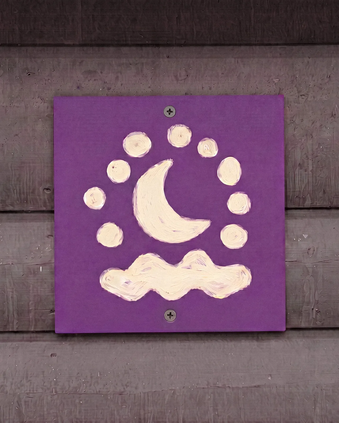 Purple House Luna moon icon sign on a wooden wall