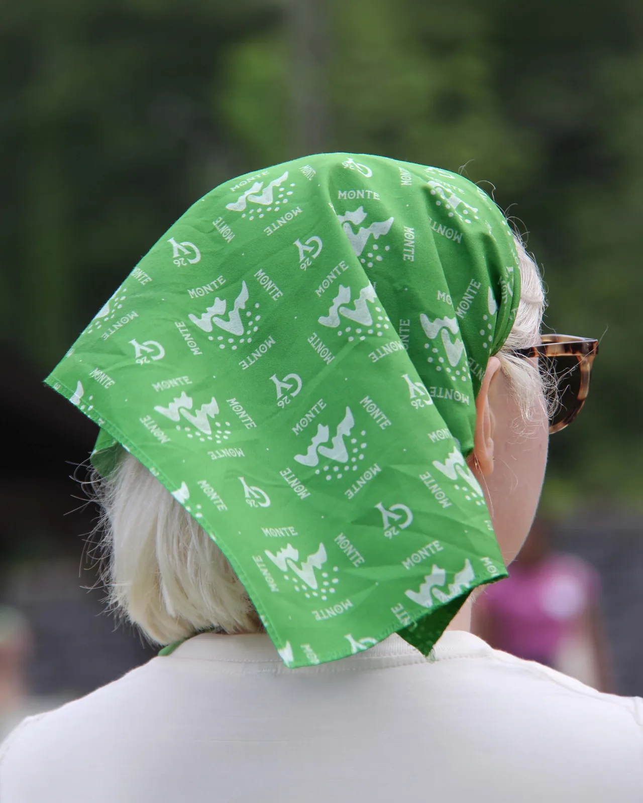 Green Camp Yerba bandana printed with the icon pattern