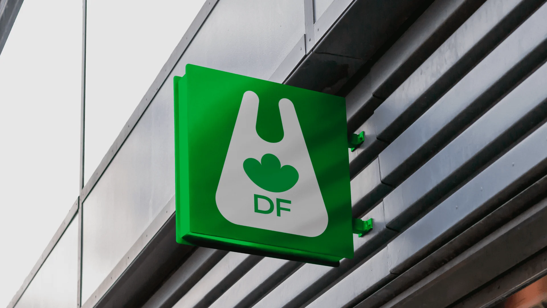 DailyFood DF blade sign on a station wall