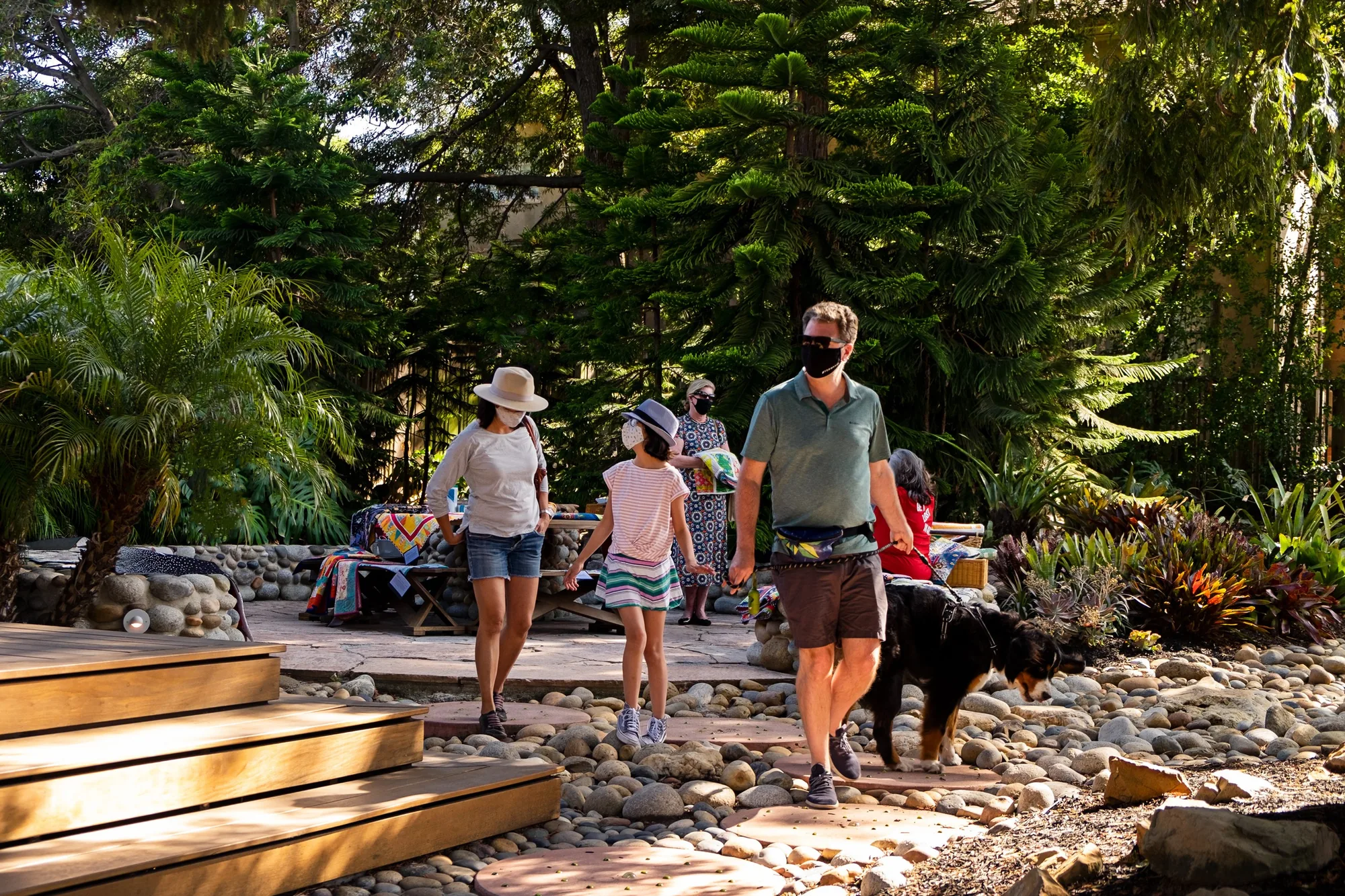 Families walking a garden route on the Piedmont Art Walk