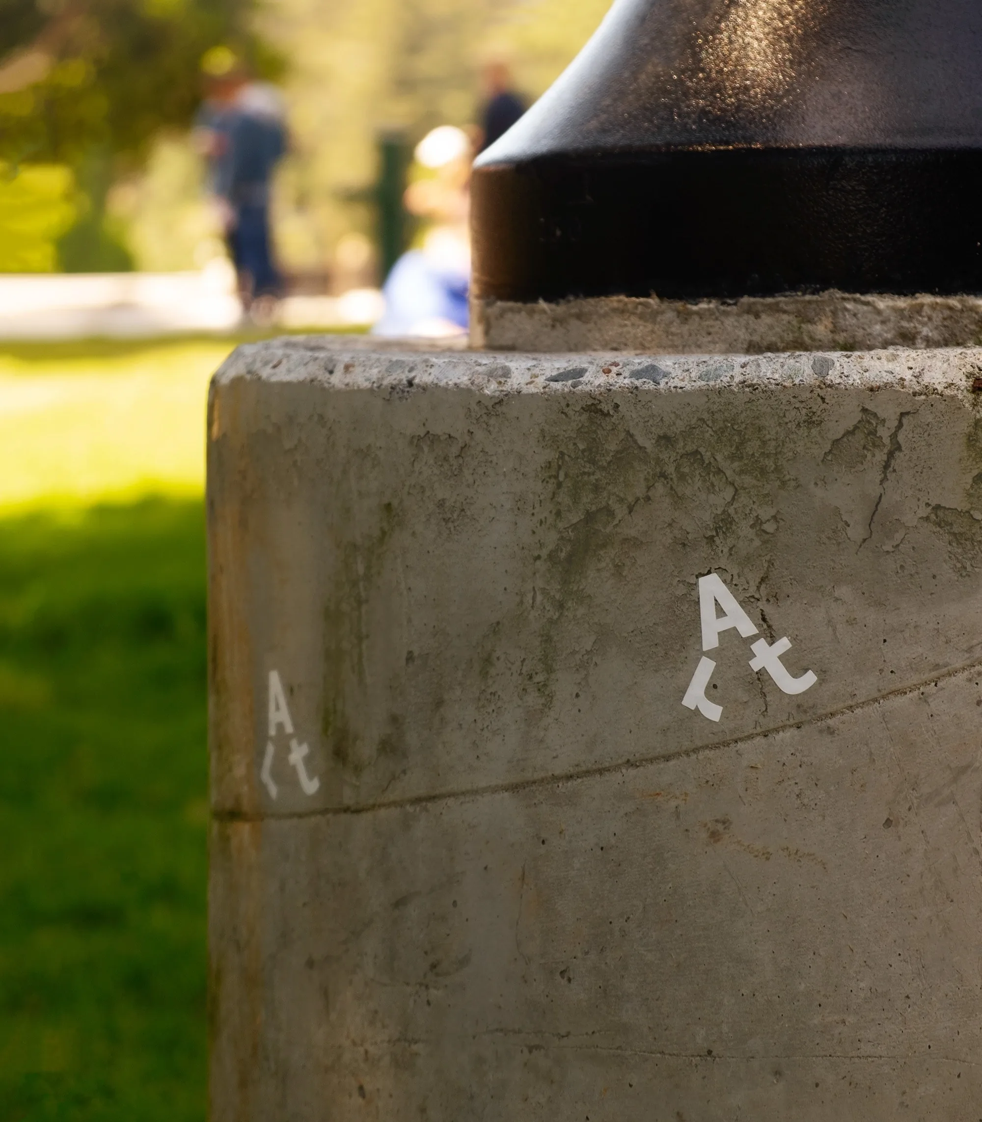 Walking Art symbol stencilled on a park post