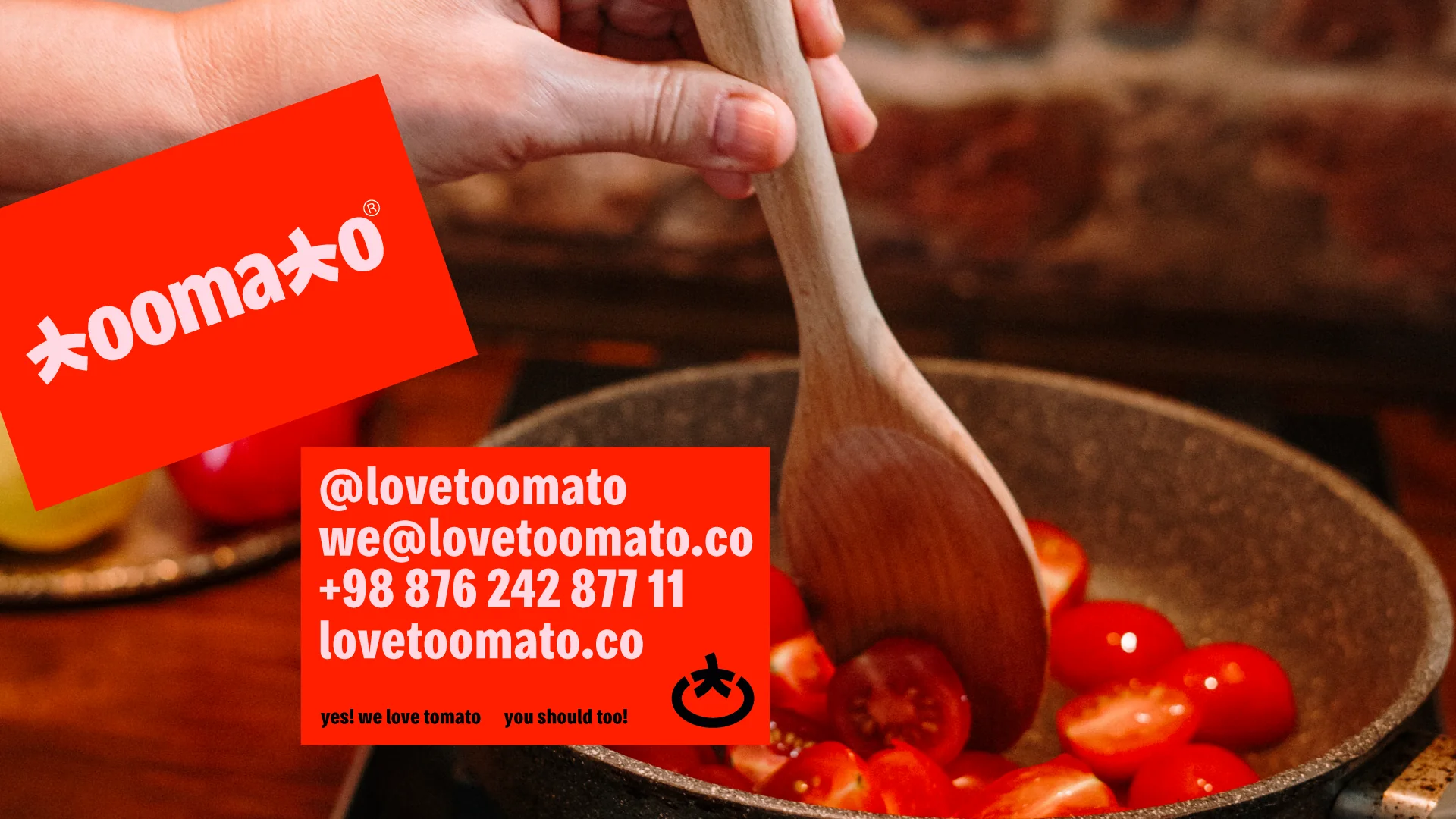 Toomato business card and contact card over a pan of cherry tomatoes