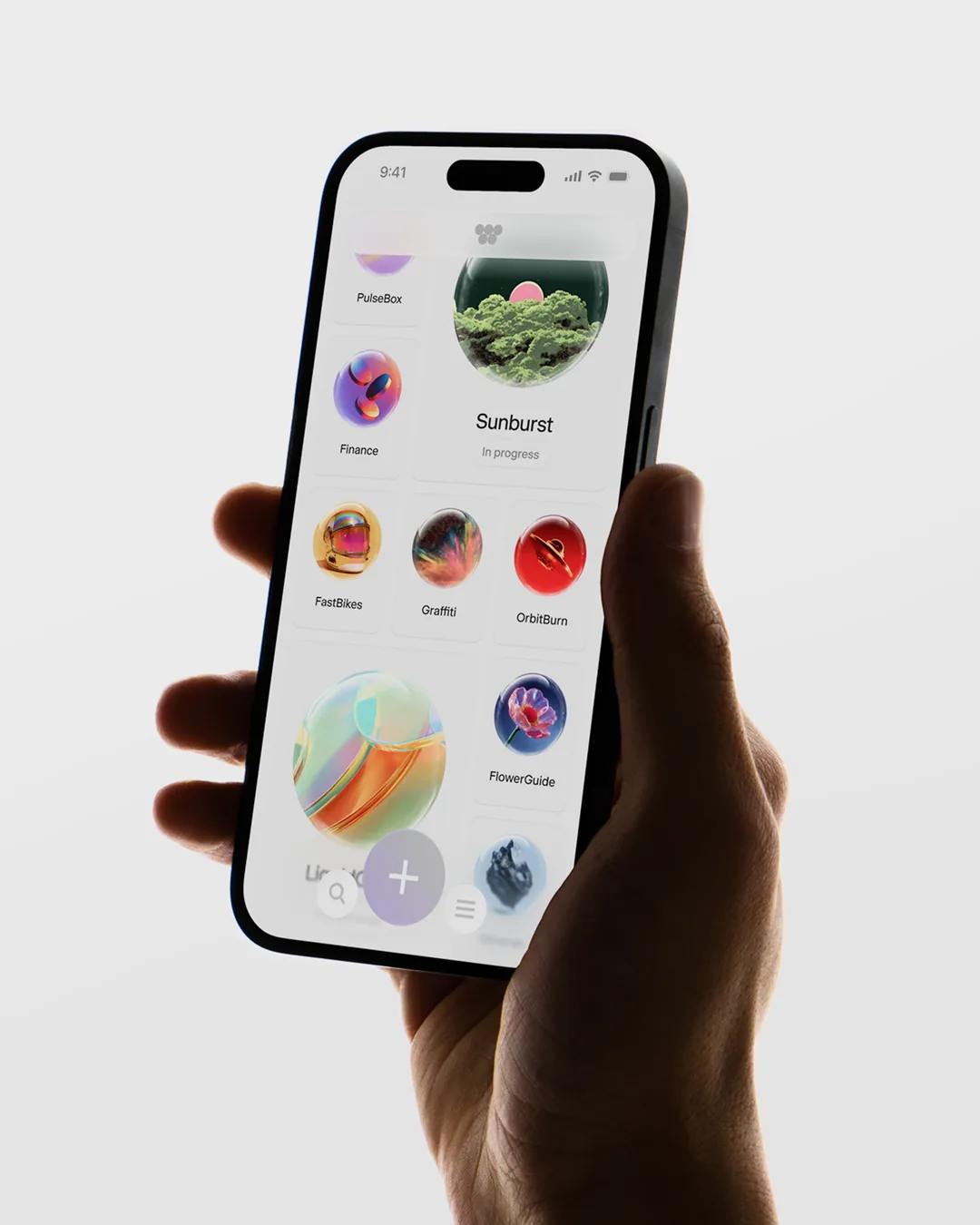 Hand holding a phone with the Wabi home screen of personal apps
