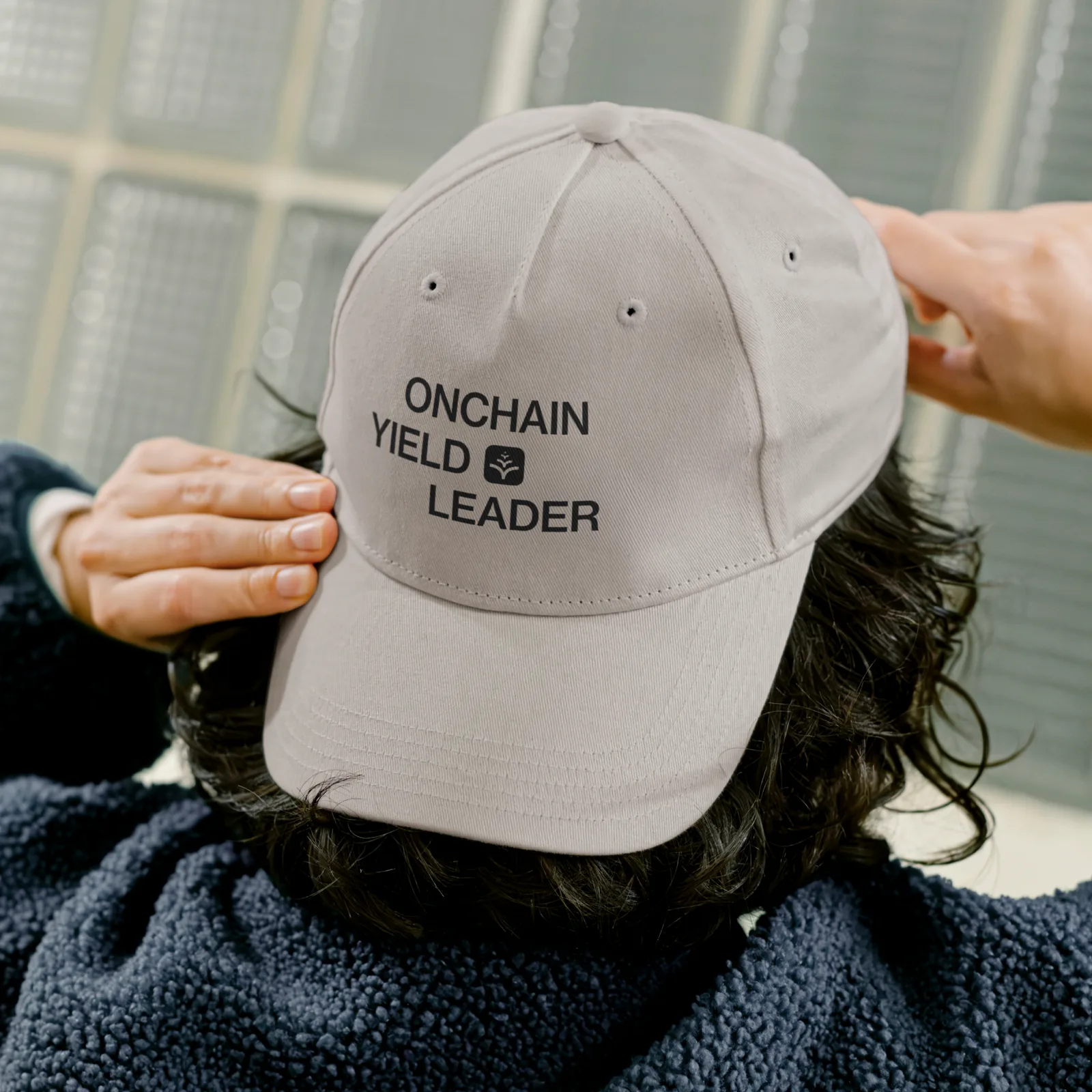Grey cap embroidered with Onchain Yield Leader and the Yield symbol